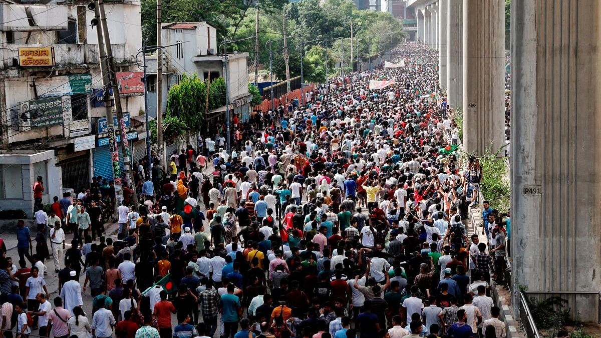 <div class="paragraphs"><p>People celebrate the resignation of Prime Minister Sheikh Hasina in Dhaka, Bangladesh.</p></div>