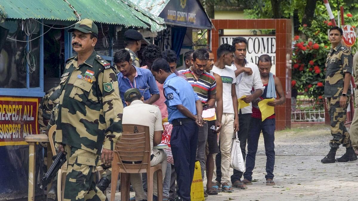 <div class="paragraphs"><p>File photos of BSF personnel at the border as&nbsp;truck drivers complete formalities to return to India from Bangladesh. (Representative image)</p></div>