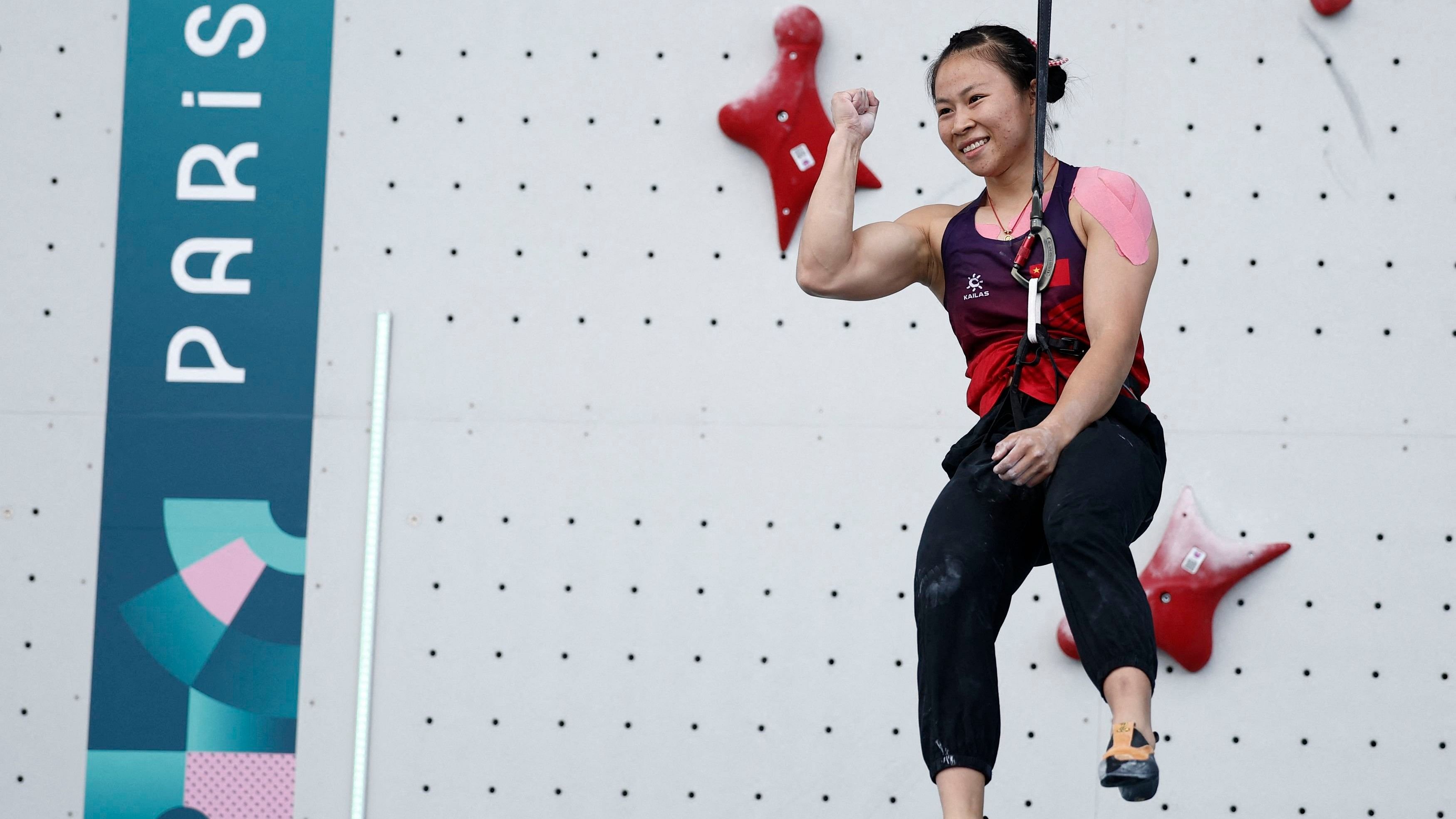 <div class="paragraphs"><p>Paris 2024 Olympics - Climbing - Women's Speed, Quarterfinals - Le Bourget Sport Climbing Venue, Le Bourget, France - August 7, 2024. Lijuan Deng of China celebrates winning the race. </p></div>