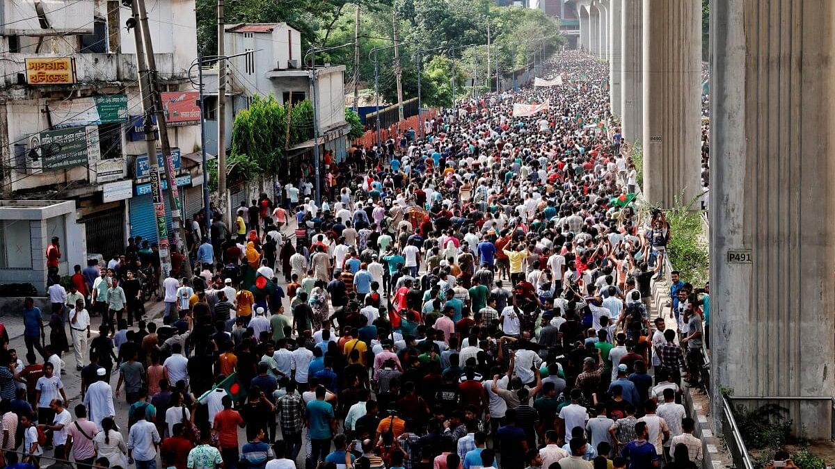 <div class="paragraphs"><p>People celebrate the resignation of Prime Minister Sheikh Hasina in Dhaka, Bangladesh.</p></div>