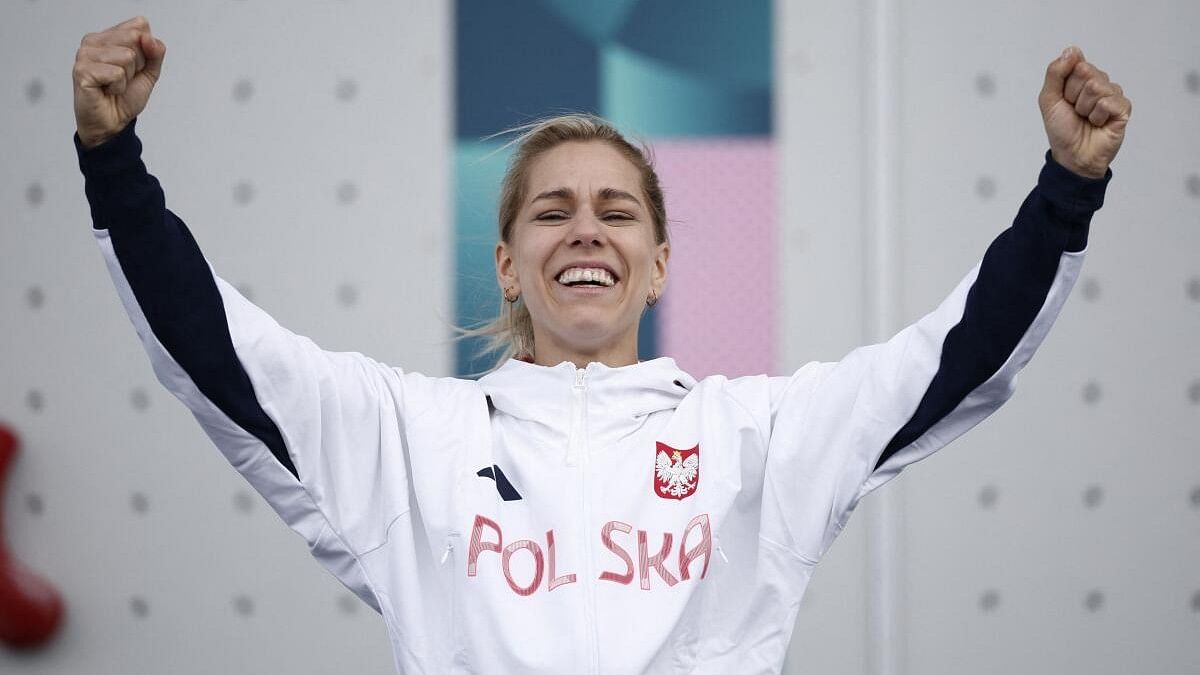 <div class="paragraphs"><p>Gold medallist Aleksandra Miroslaw celebrates on the podium.</p></div>