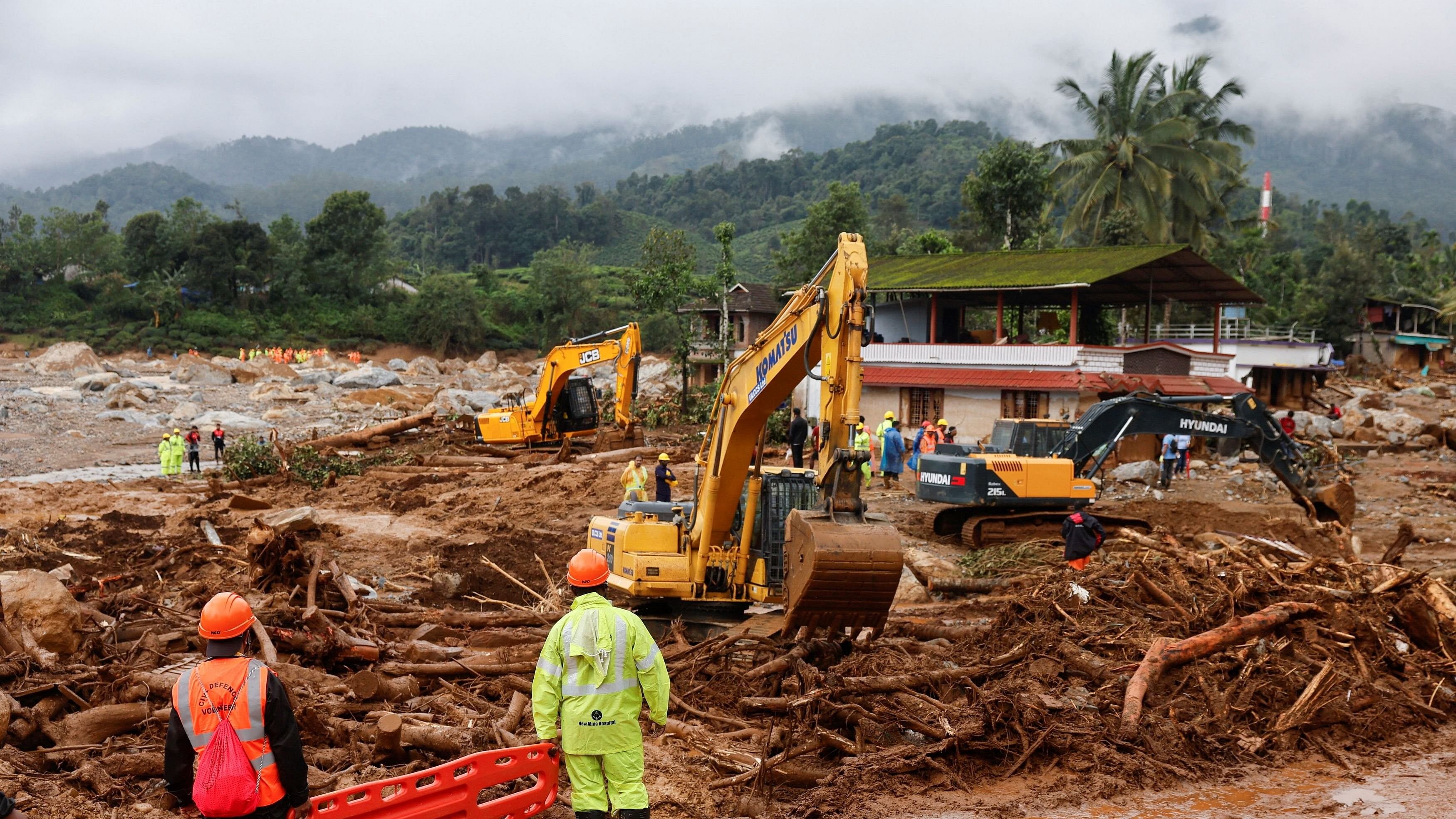 <div class="paragraphs"><p>Rescuers hold a stretcher as the search for survivors continues after several landslides hit the hills in Wayanad district.</p></div>