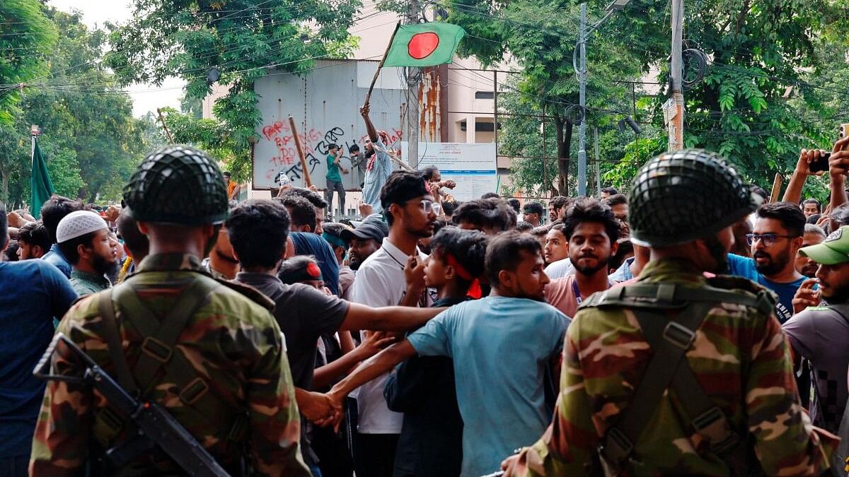 <div class="paragraphs"><p>People celebrate the resignation of Prime Minister Sheikh Hasina in Dhaka, Bangladesh, August 5, 2024. </p></div>