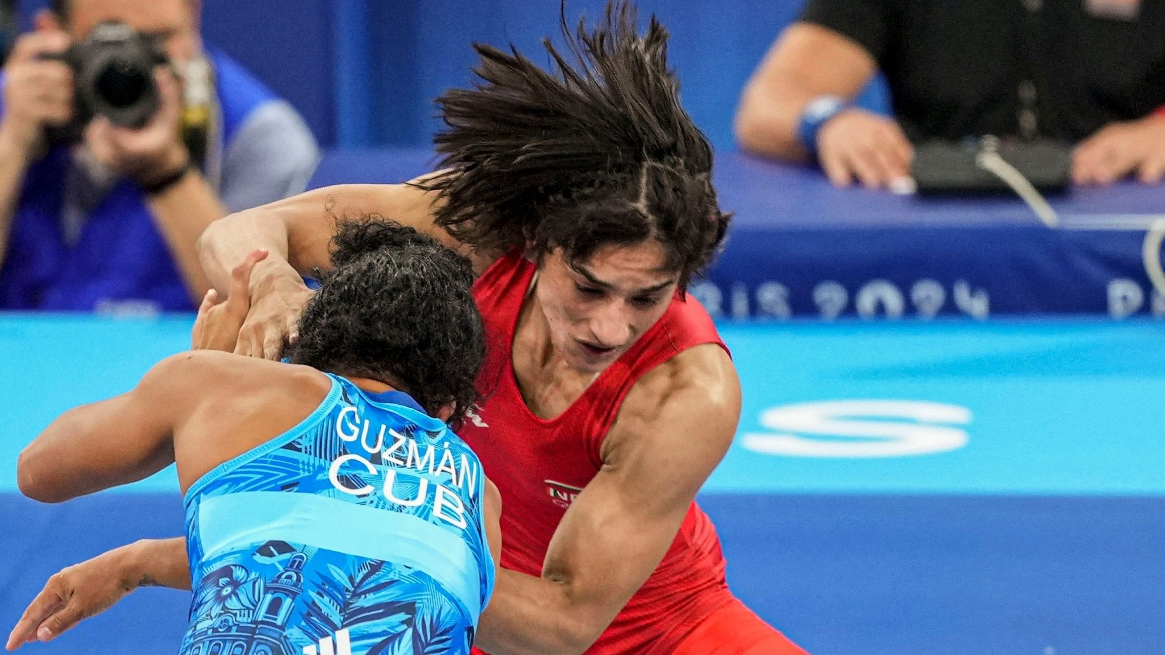 <div class="paragraphs"><p>Vinesh Phogat made history as the first Indian woman wrestler to advance to the Olympic Games final, securing a decisive 5-0 victory over Cuba's Yusneylis Guzman Lopez.</p></div>