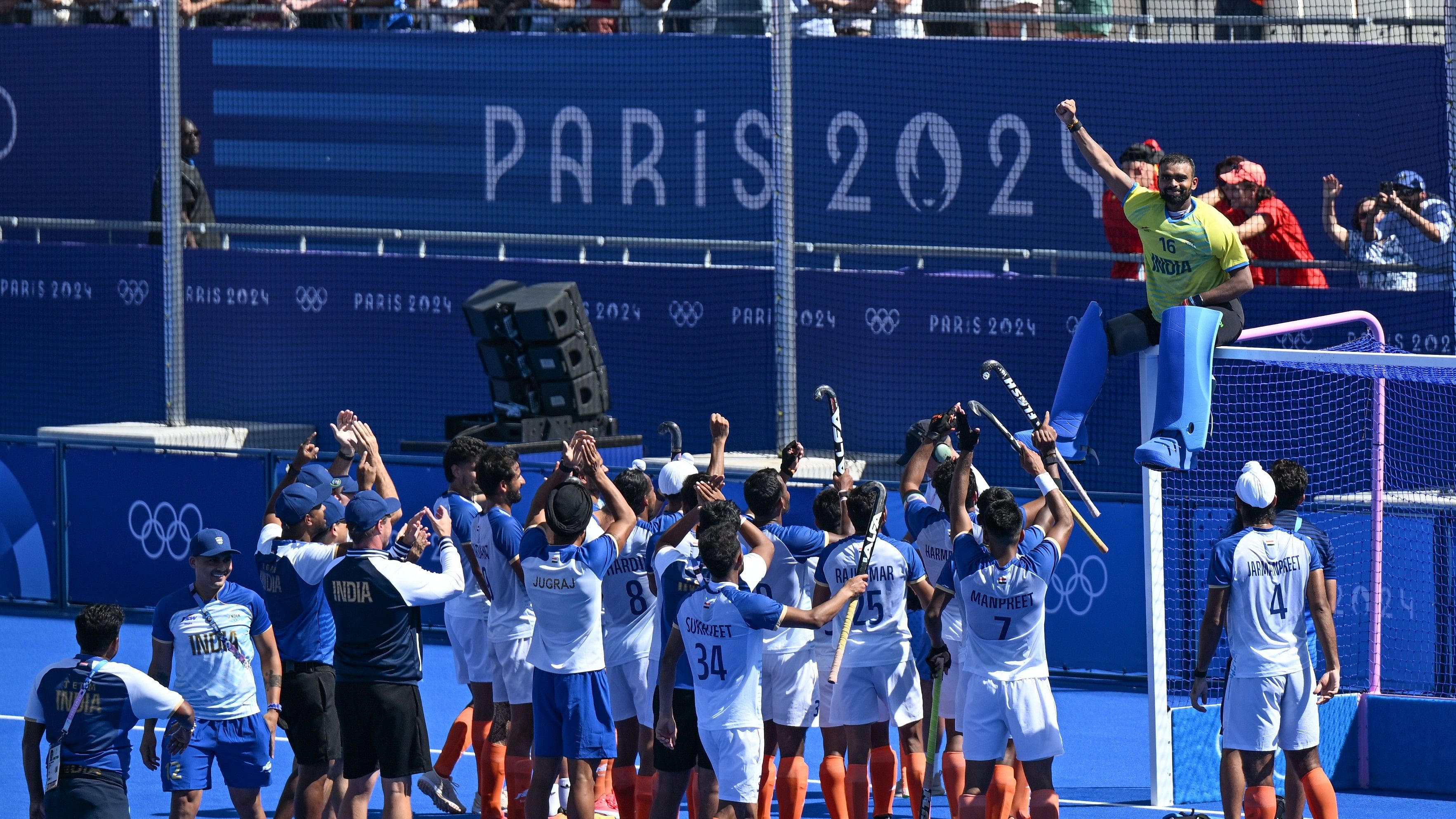 <div class="paragraphs"><p>PR Sreejesh is the toast of his team-mates as Indian players celebrate after winning hockey bronze medal match against Spain.</p></div>