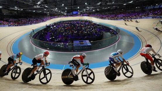 <div class="paragraphs"><p>Alan Banaszek of Poland and Benjamin Thomas of France in action at the Track Cycling, Men's Omnium, Scratch Race 1/4 at the Saint-Quentin-en-Yvelines Velodrome, Montigny-le-Bretonneux, France on August 8</p></div>