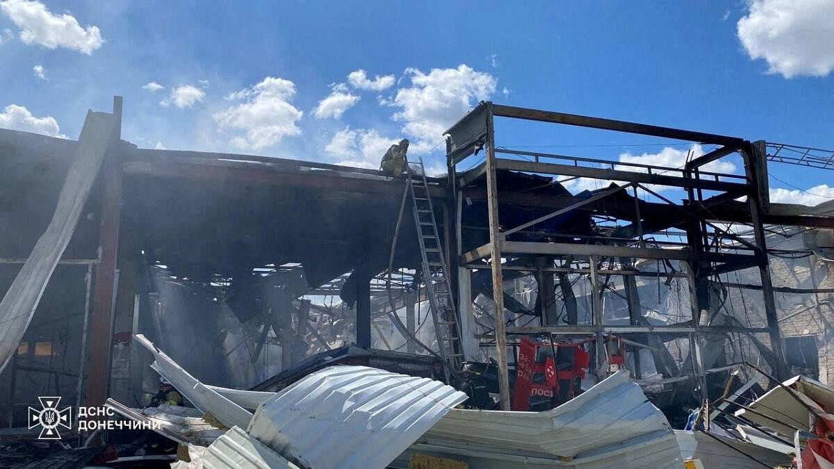 <div class="paragraphs"><p>Firefighters work at a site of a supermarket heavily damaged by a Russian military strike, amid Russia's attack on Ukraine, in Kostiantynivka, Donetsk region, Ukraine August 9, 2024.</p></div>