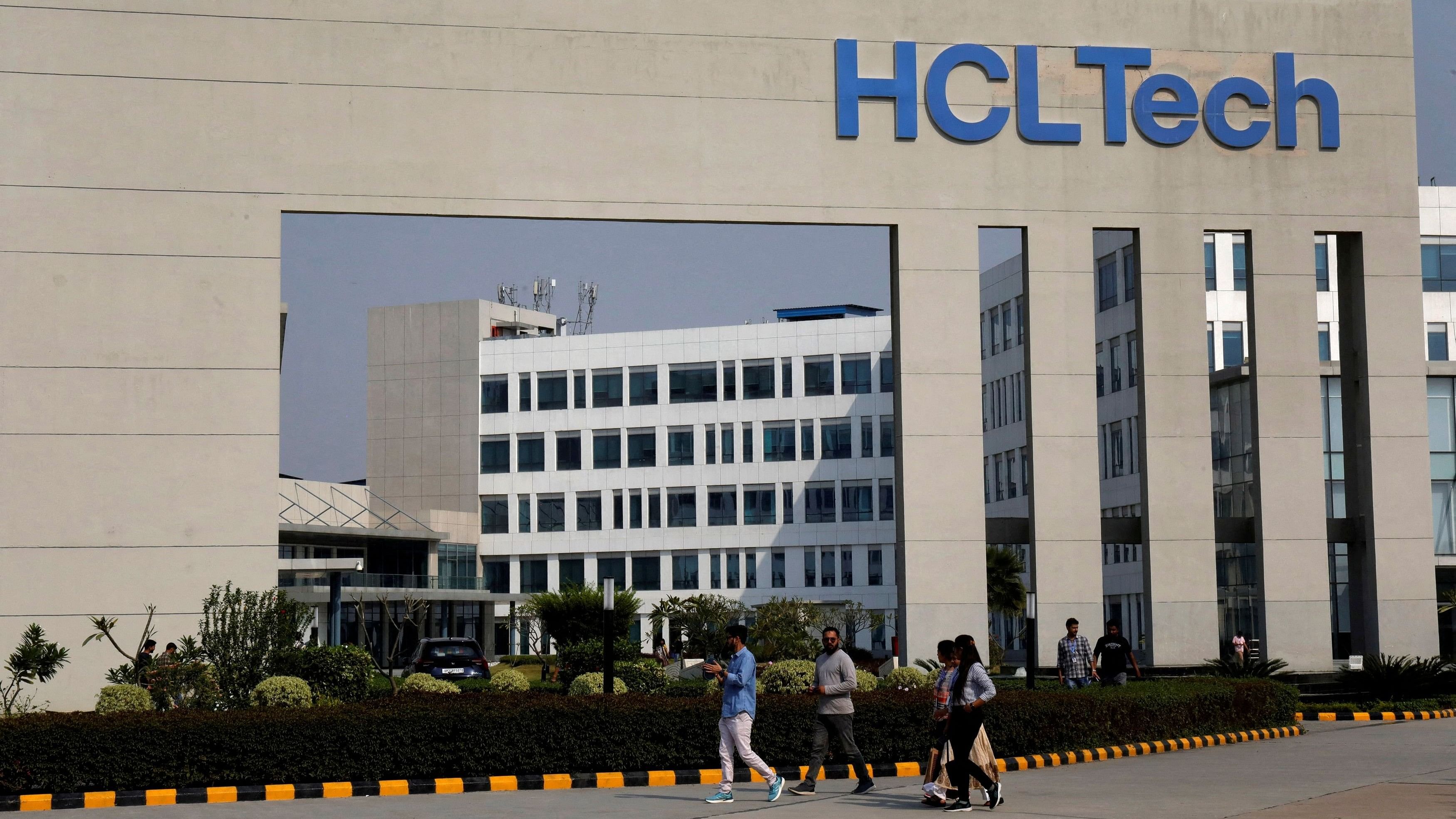 <div class="paragraphs"><p>Employees of HCLTech walk inside the office premises  </p></div>