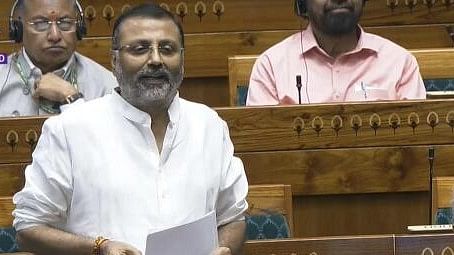 <div class="paragraphs"><p>BJP MP Nishikant Dubey speaks in the Lok Sabha as Union Finance Minister Nirmala Sitharaman looks on during the Monsoon session of Parliament, in New Delhi.&nbsp;</p></div>