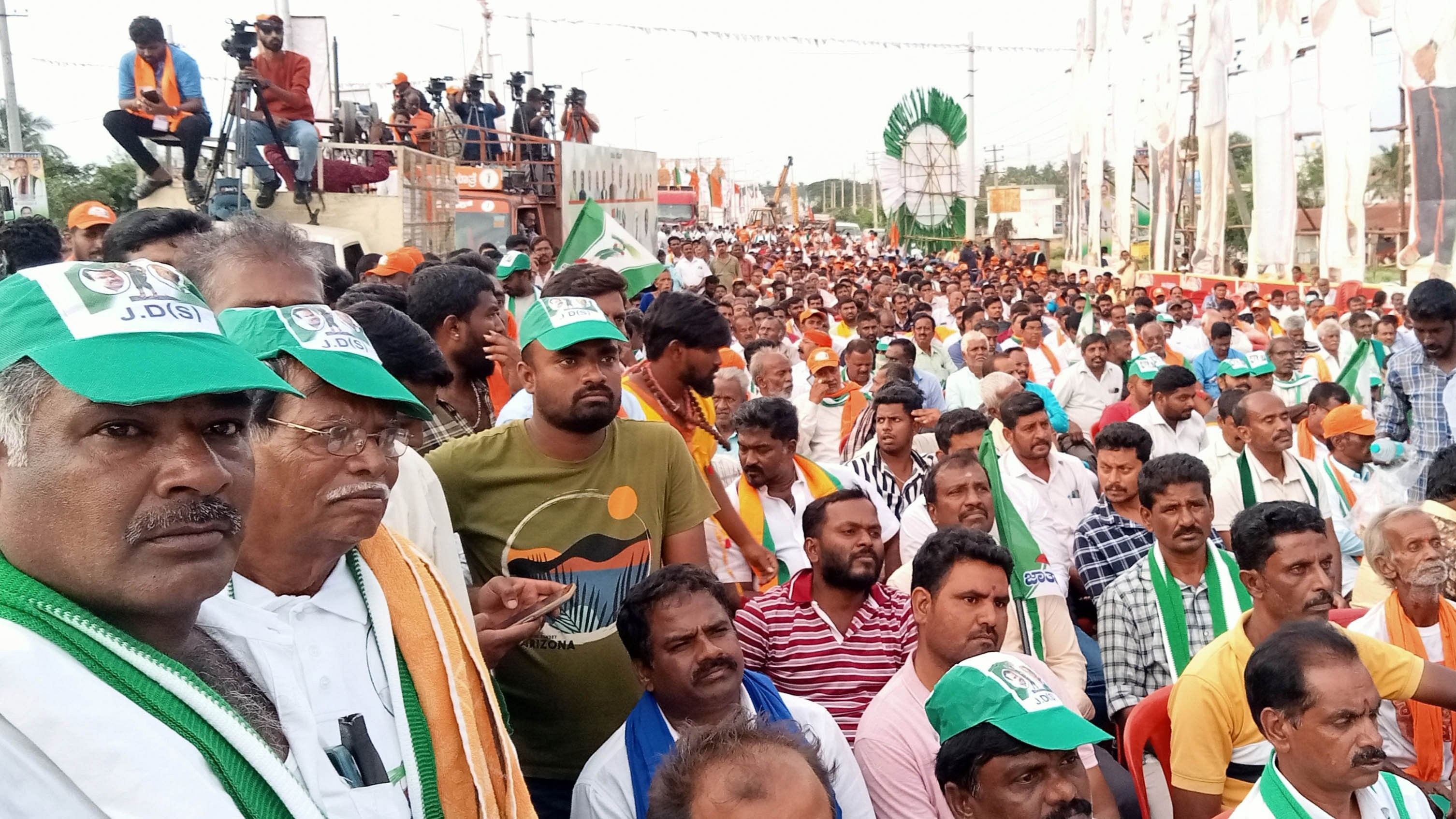 BJP and JD(S) workers take part in the padayatra at Srirangapatna in Mandya district on Thursday. 