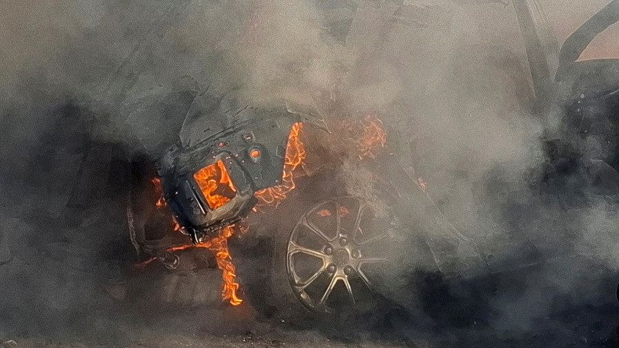 <div class="paragraphs"><p>A car burns, after an Israeli airstrike targeted a car on the edge of Lebanon's port city of Sidon, according to security sources, Lebanon August 9, 2024.</p></div>