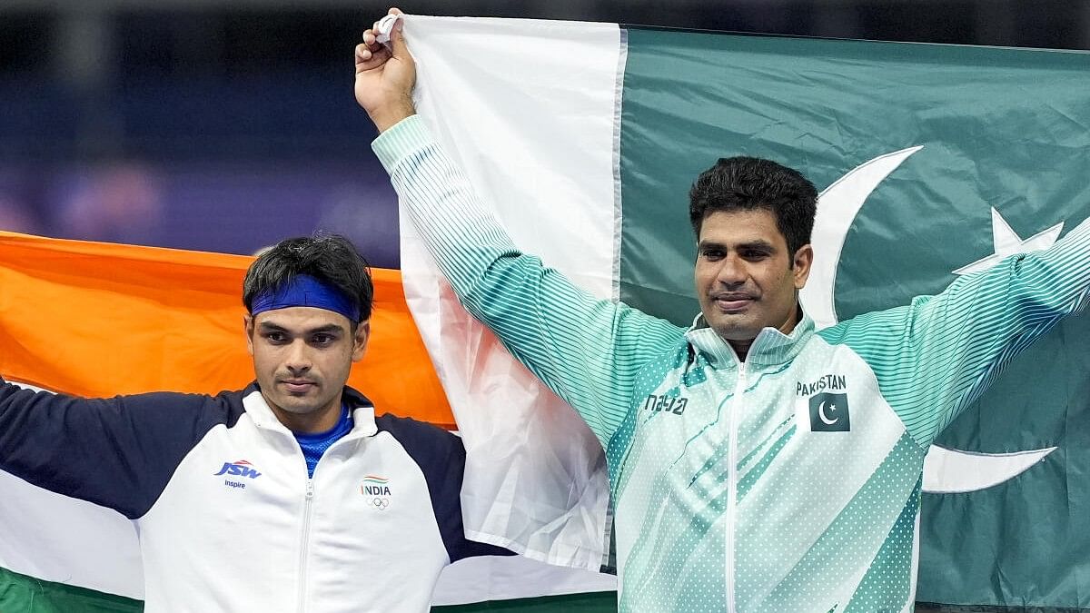 <div class="paragraphs"><p>Gold medalist Pakistan's Arshad Nadeem and Silver medalist India's Neeraj Chopra celebrate after the men's javelin throw final at the 2024 Summer Olympics, in Paris, France, Thursday, August 8, 2024.</p></div>