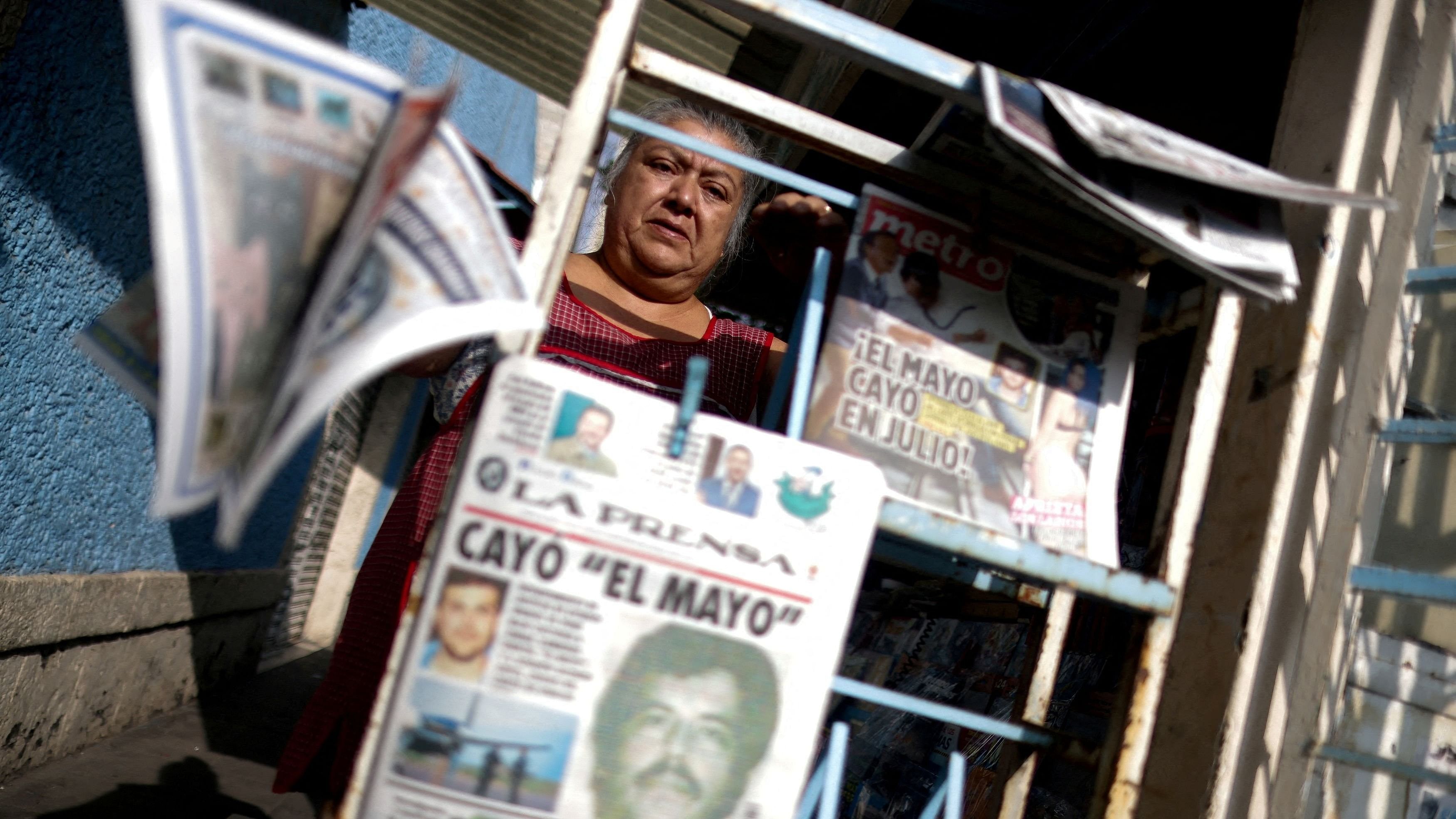 <div class="paragraphs"><p>A newspaper seller arranges newspapers reporting the El Paso, Texas, US, arrest of Mexican drug lord Ismael "El Mayo" Zambada and Joaquin Guzman Lopez, "El Chapo" Guzman's son, in Mexico City, Mexico July 26, 2024</p></div>