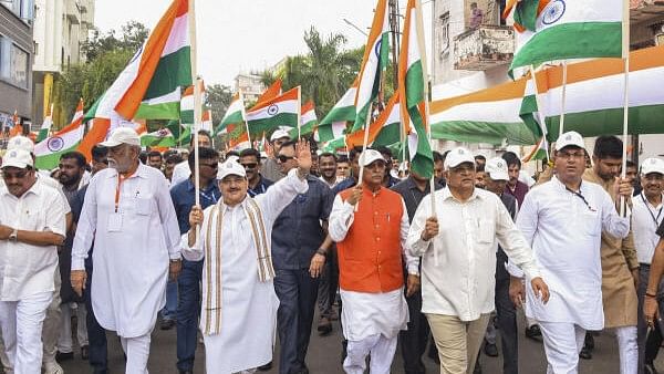 <div class="paragraphs"><p>Union Minister JP Nadda and Gujarat Chief Minister Bhupendra Patel participate in a 'tiranga yatra' ahead of Independence Day, in Rajkot, Saturday.&nbsp;</p></div>