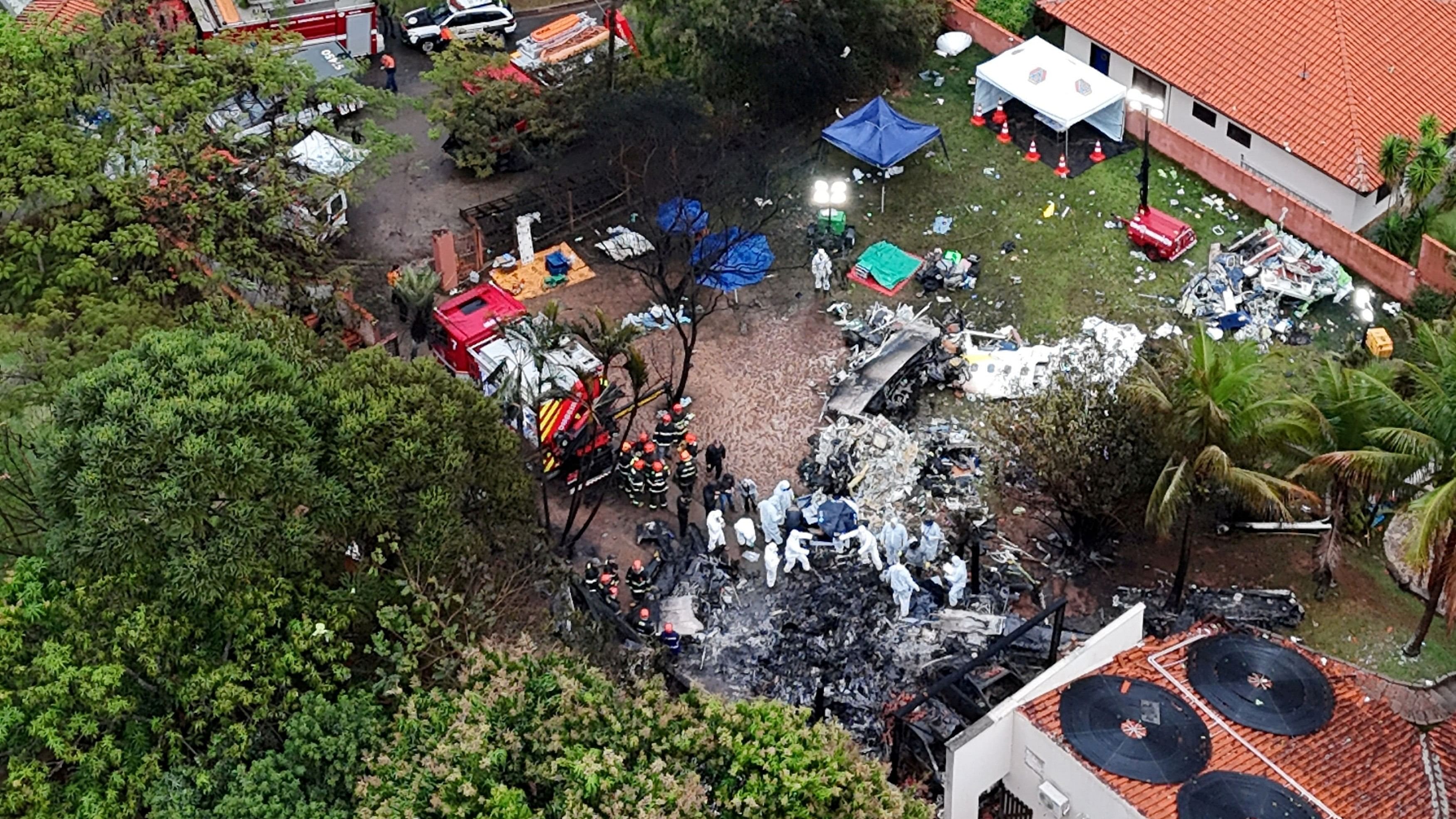 <div class="paragraphs"><p>A drone view shows people working at the site of a plane crash in Vinhedo, Sao Paulo, Brazil, August 10, 2024. </p></div>