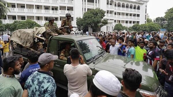 <div class="paragraphs"><p>Protesters gather at the High Court premises demanding the resignation of Obaidul Hassan, chief justice of Bangladesh in Dhaka.&nbsp;</p></div>