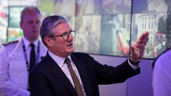 <div class="paragraphs"><p>British Prime Minister Keir Starmer views CCTV screens in the Engineering Suite in the Metropolitan Police Command and Control Special Operations Room at Lambeth Police Headquarters in London, Britain August 9, 2024. </p></div>