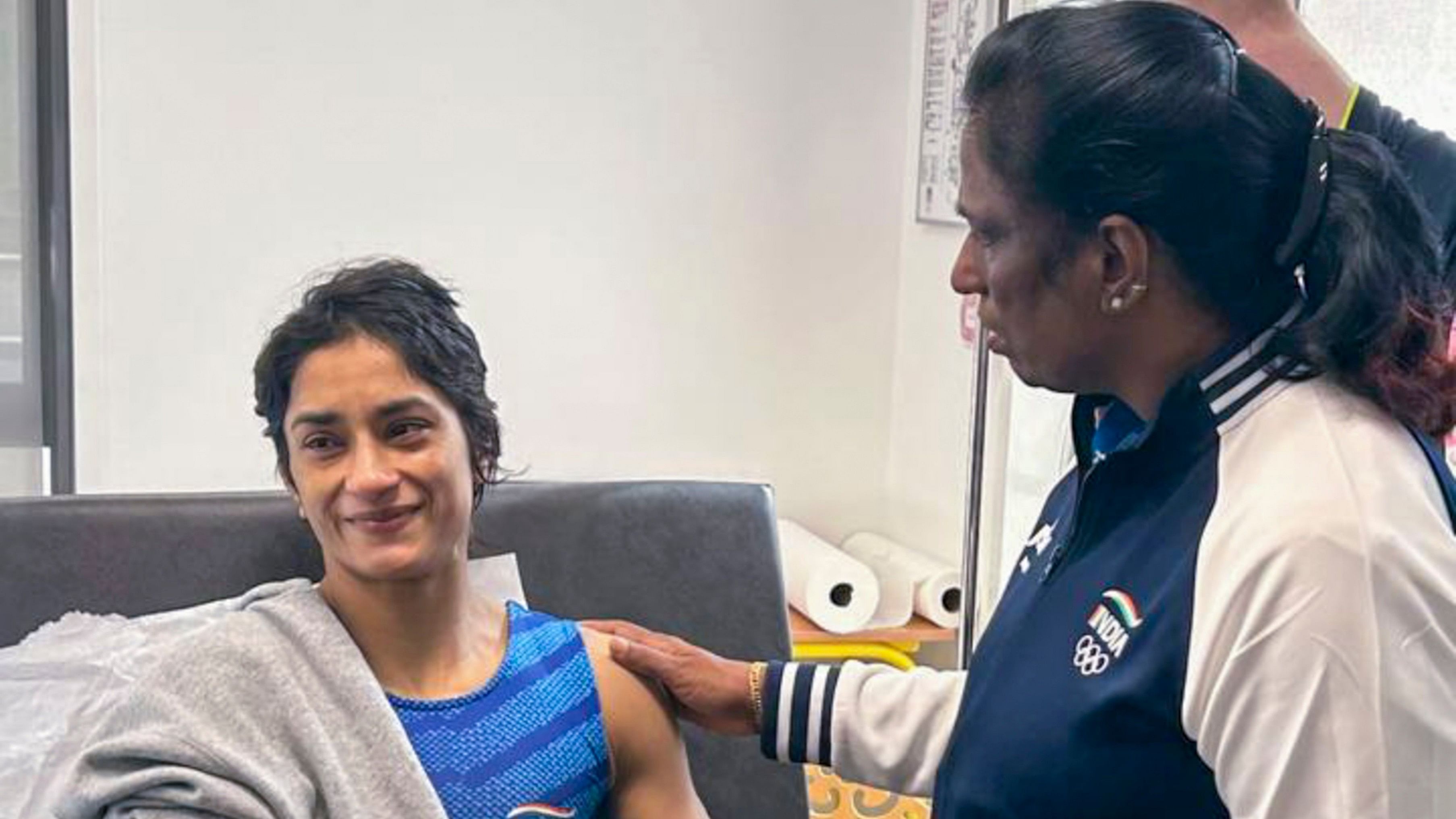 <div class="paragraphs"><p> Indian Olympics Association (IOA) President PT Usha meets wrestler Vinesh Phogat after the latter was hospitalised following her disqualification from the Paris Olympics as she was found overweight ahead of her women's 50kg final match, in Paris, France, Wednesday, Aug. 7, 2024. </p></div>