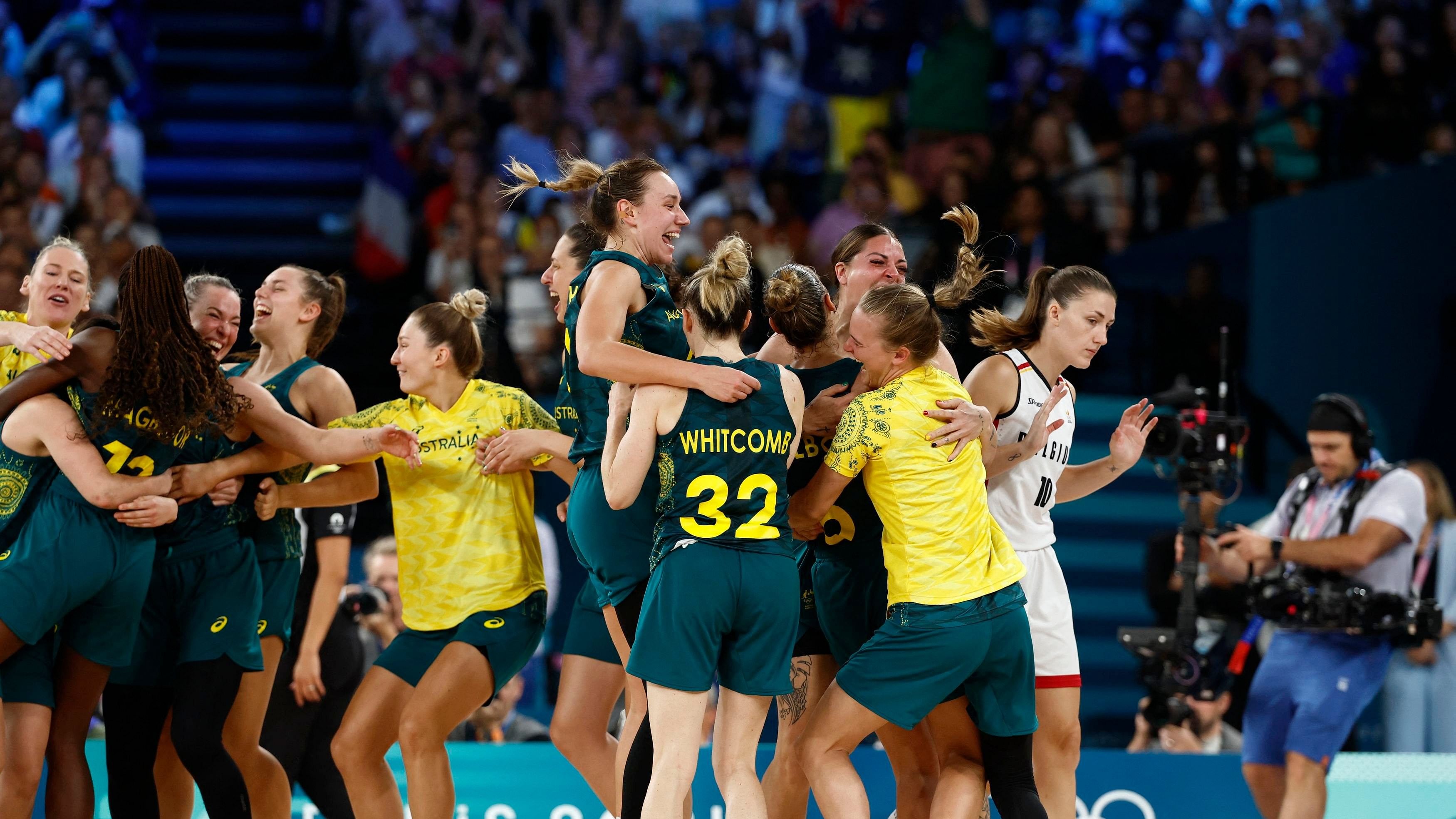 <div class="paragraphs"><p>  Alanna Smith of Australia, Sami Whitcomb of Australia and teammates celebrate the team's win. </p></div>