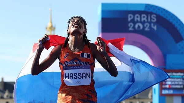 <div class="paragraphs"><p>Sifan Hassan of Netherlands celebrates at Invalides after winning gold.</p></div>