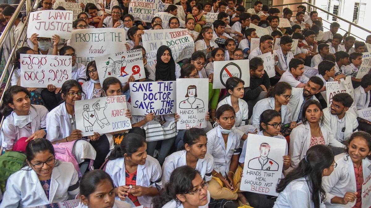 <div class="paragraphs"><p>Resident doctors and postgraduate medical students protest outside the OPD of Victoria Hospital on Monday. </p></div>