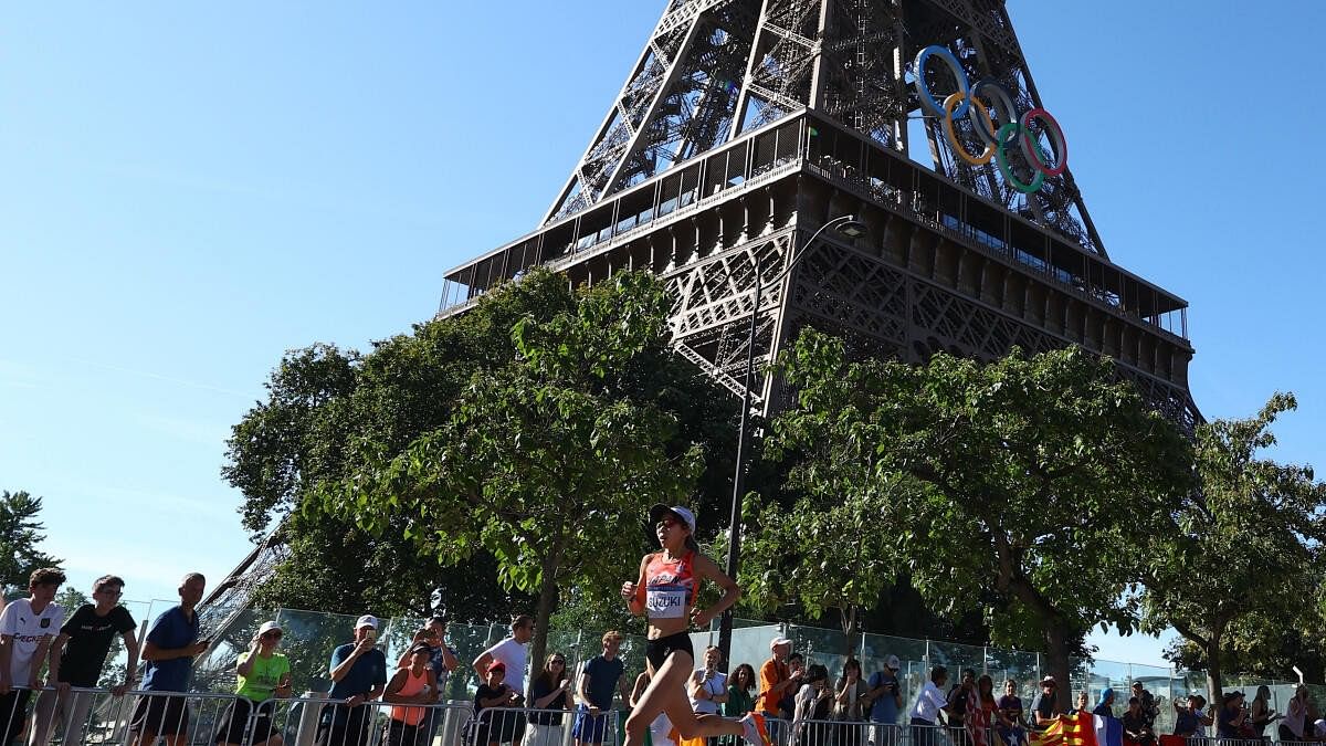 <div class="paragraphs"><p>Yuka Suzuki of Japan in action as she runs past the Eiffel Tower.</p></div>