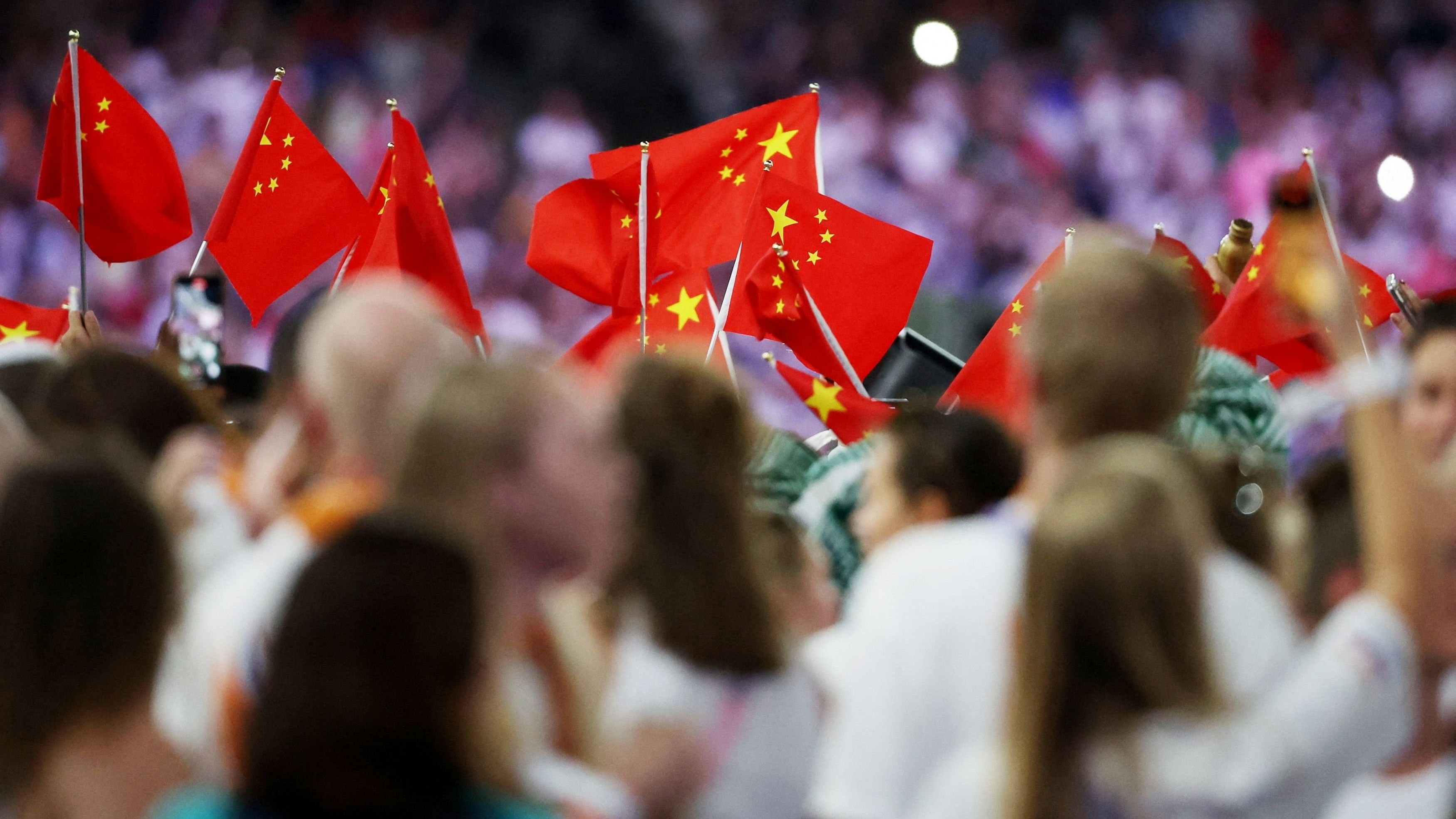 <div class="paragraphs"><p>Athletes of China during the parade. </p></div>