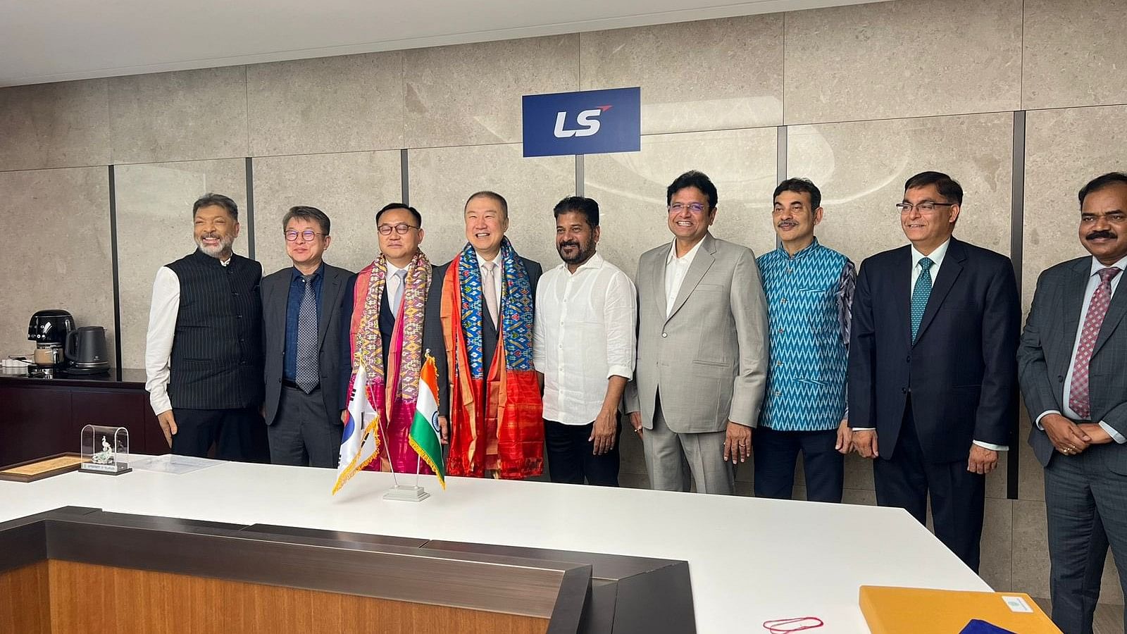 <div class="paragraphs"><p>Telangana CM A Revanth Reddy (5th from left) along with other delegates from the state during their meeting with LS Corp officials in South Korea.</p></div>