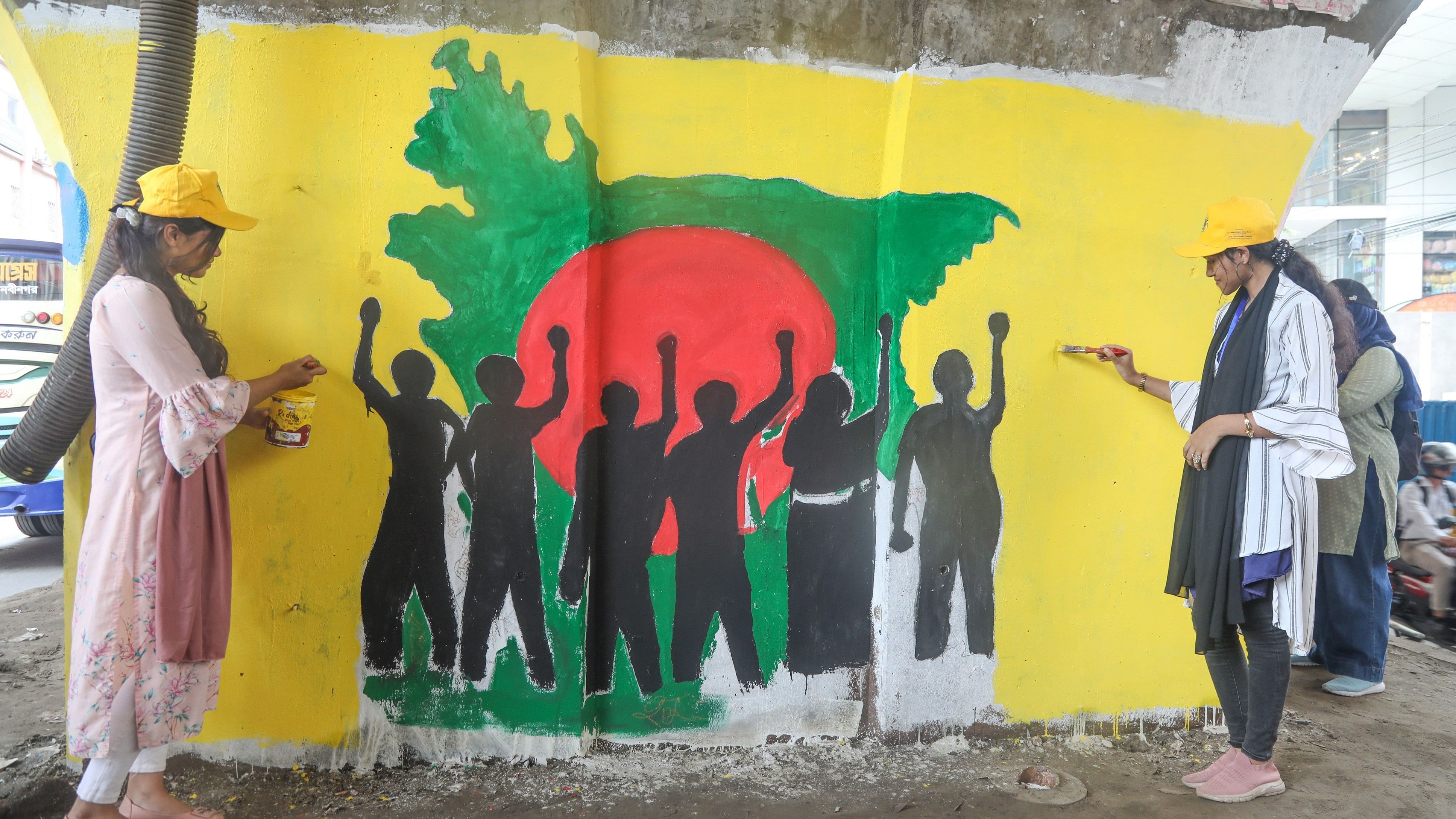 <div class="paragraphs"><p>Dhaka : Students paint a new graffiti on a street wall in Dhaka, Bangladesh, 10 August 2024. </p></div>