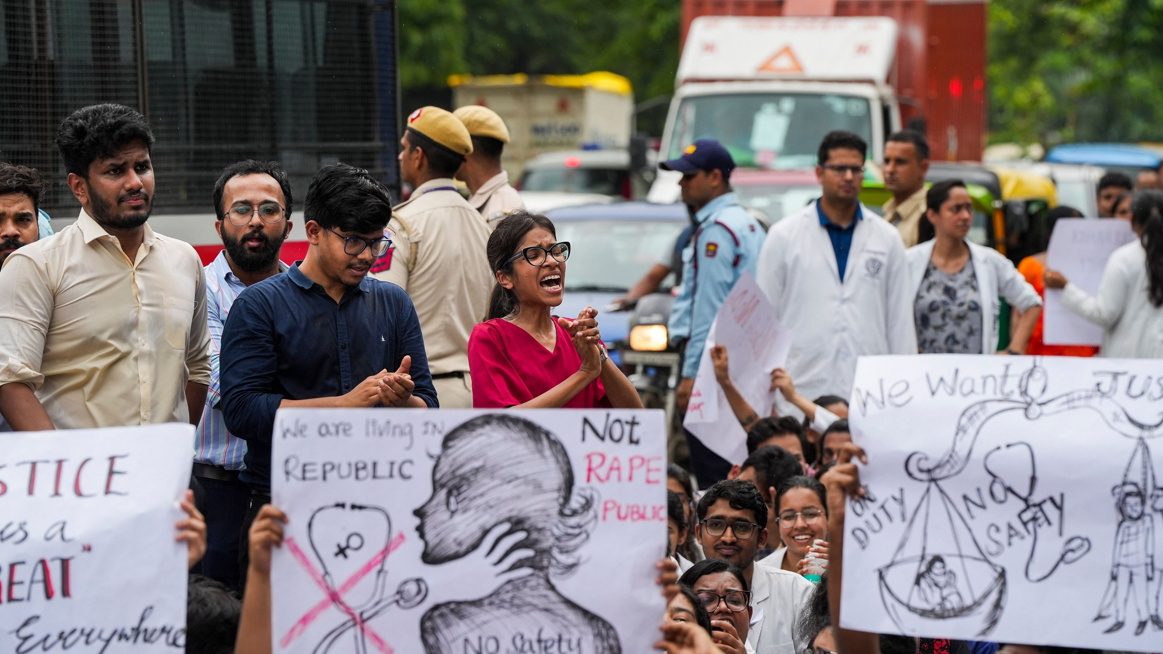 <div class="paragraphs"><p>Doctors protest against the sexual assault and killing of a postgraduate trainee doctor in Kolkata, in New Delhi, Monday, Aug. 12, 2024. </p></div>