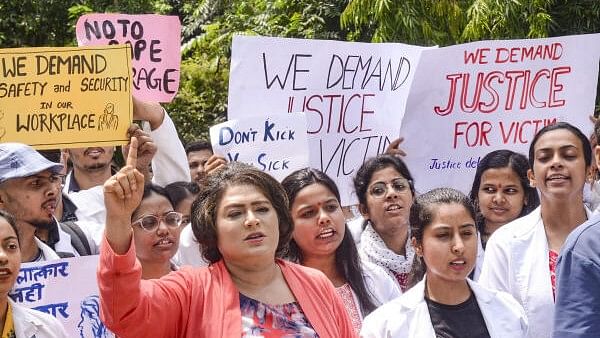 <div class="paragraphs"><p>Junior doctors of Rajendra Institute of Medical Sciences (RIMS) stage a protest against the sexual assault and murder of a postgraduate trainee doctor in Kolkata, in Ranchi.</p></div>