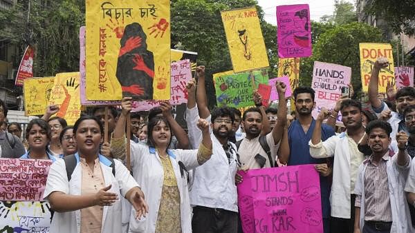 <div class="paragraphs"><p>Junior doctors, trainee doctors and medical students protest against the sexual assault and killing of a post-graduate trainee doctor at RG Kar Medical College, in Kolkata.</p></div>