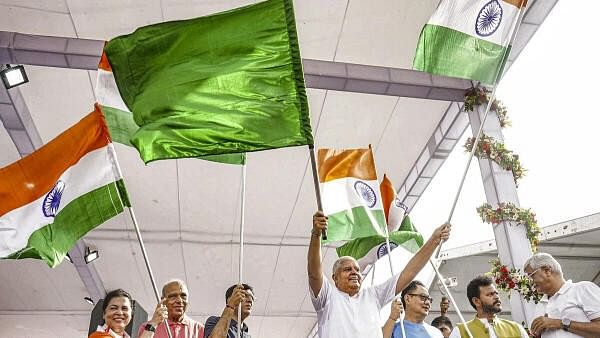 <div class="paragraphs"><p>Vice-President Jagdeep Dhankhar with Union Ministers Mansukh L. Mandaviya, Kiren Rijiju, Gajendra Singh Shekhawat and K. Ram Mohan Naidu flags off the 'Har Ghar Tiranga' bike rally ahead of Independence Day, at Bharat Mandapam, in New Delhi.</p></div>