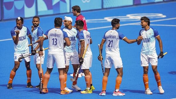 <div class="paragraphs"><p> India's captain Harmanpreet Singh (13) celebrates with teammates after scoring a goal during the men's hockey bronze medal match between India and Spain at the 2024 Summer Olympics, in Colombes, France.</p></div>