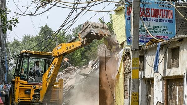 <div class="paragraphs"><p>Representative image showing an MCD demolition drive.</p></div>