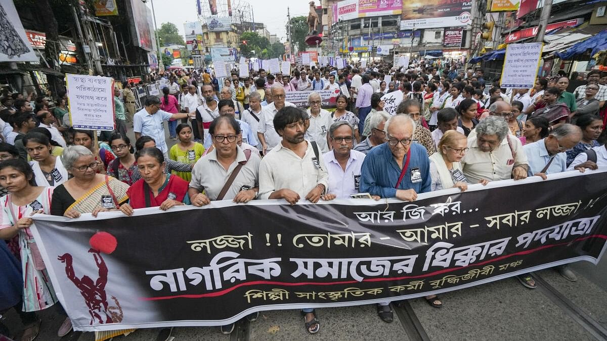 <div class="paragraphs"><p>Civil Society activists participate in a march to condemn the sexual assault and murder of a postgraduate trainee doctor at the RG Kar Medical College, in Kolkata, Tuesday, August 13, 2024.</p></div>