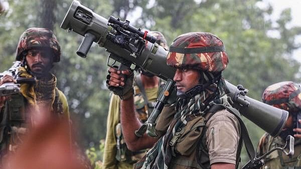 <div class="paragraphs"><p>Representative image showing army personnel with a weapon in J&amp;K's Doda.</p></div>