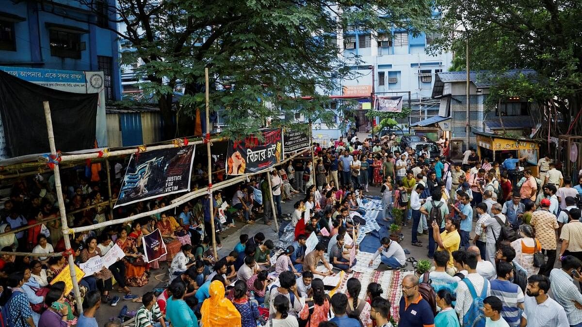 <div class="paragraphs"><p>Doctors, paramedics and medical students  protest against the rape and murder of a trainee doctor, inside the premises of R G Kar Medical College and Hospital in Kolkata, India.</p></div>