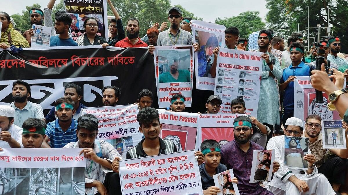 <div class="paragraphs"><p>Victims and relatives of people injured and killed during unrest join a protest at Shaheed Minar, in Dhaka.</p></div>