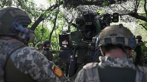 <div class="paragraphs"><p>Ukraine servicemen prepare a Caesar self-propelled howitzer to fire towards Russian troops, outside the town of Pokrovsk, amid Russia's attack on Ukraine, in Donetsk region, Ukraine August 13, 2024.</p></div>