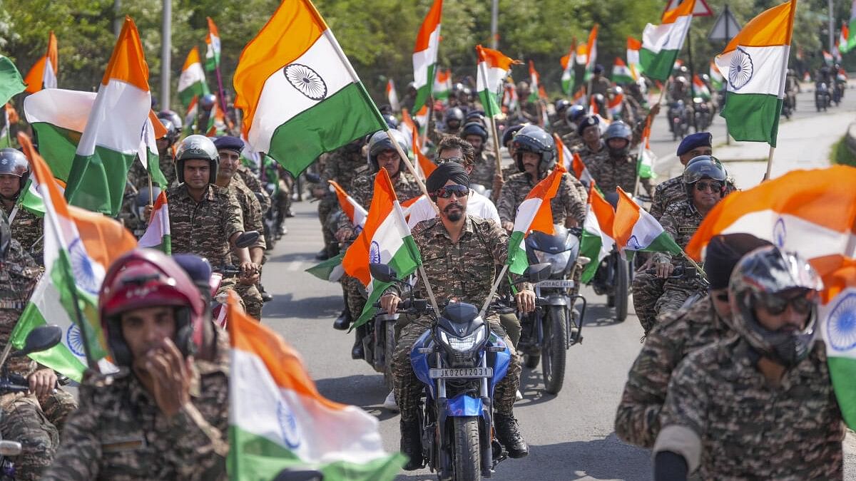 <div class="paragraphs"><p>CRPF personnel take part in 'Har Ghar Tiranga' bike rally.</p></div>