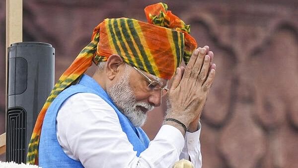 <div class="paragraphs"><p>Prime Minister Narendra Modi greets the gathering at the Red Fort on 78th Independence Day, in New Delhi, Thursday, Aug. 15, 2024. </p></div>