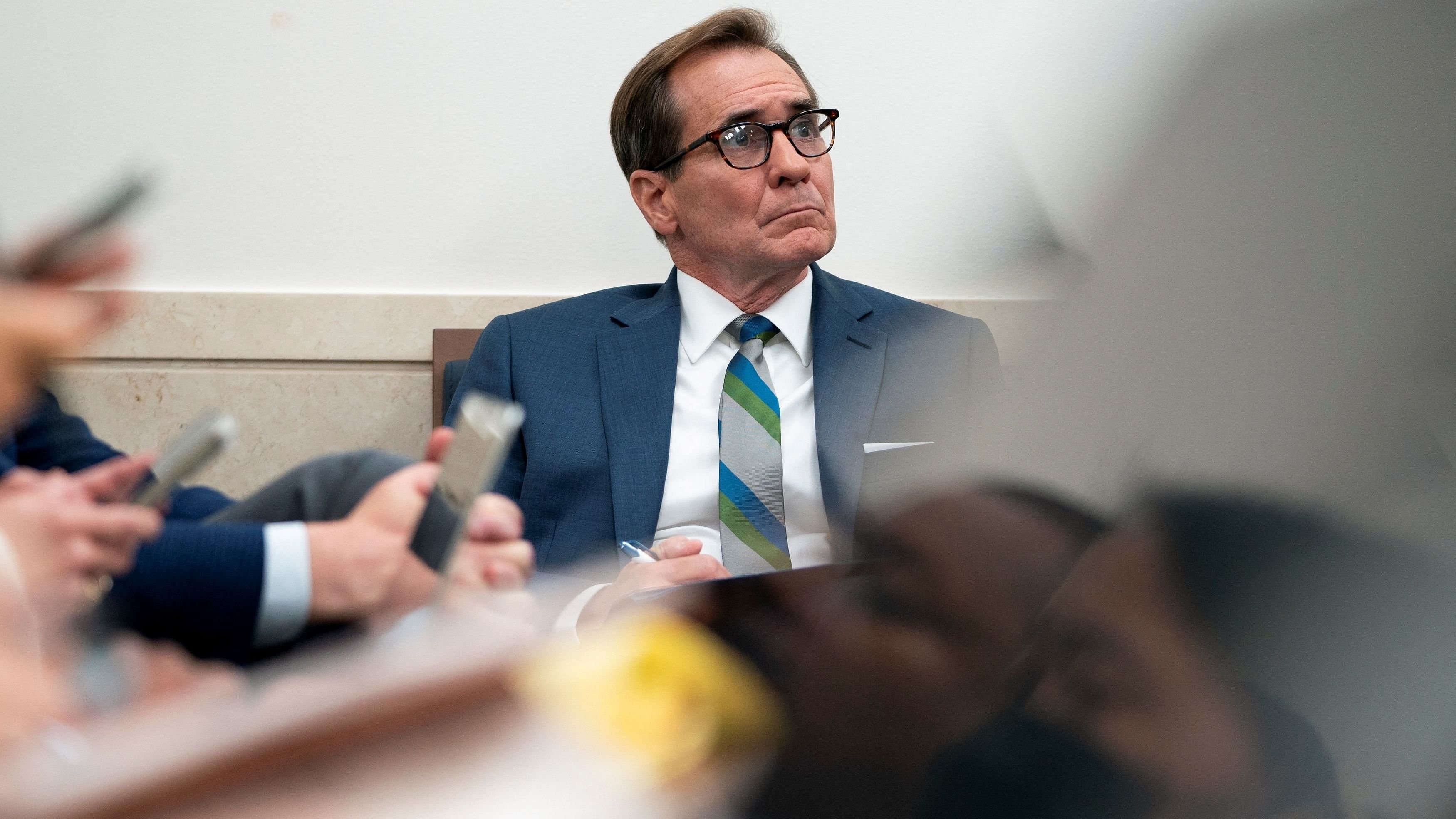 <div class="paragraphs"><p>National Security Communications Advisor John Kirby listens as White House.</p></div>