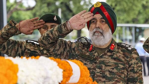 <div class="paragraphs"><p>Army officials pay tribute to the mortal remains of martyr Captain Deepak Singh, who was killed in the recent terrorist encounter in Doda district, at the Air Force Station, in Jammu, Thursday, Aug. 15, 2024.</p></div>