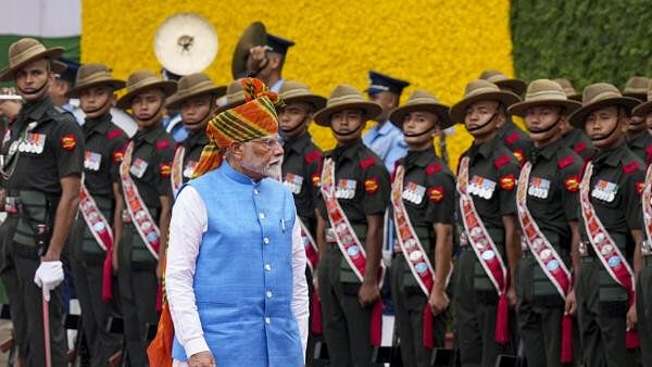 <div class="paragraphs"><p>Prime Minister Narendra Modi inspects a Guard of Honour on 78th Independence Day at the Red Fort, in New Delhi, Thursday, Aug. 15, 2024. </p></div>