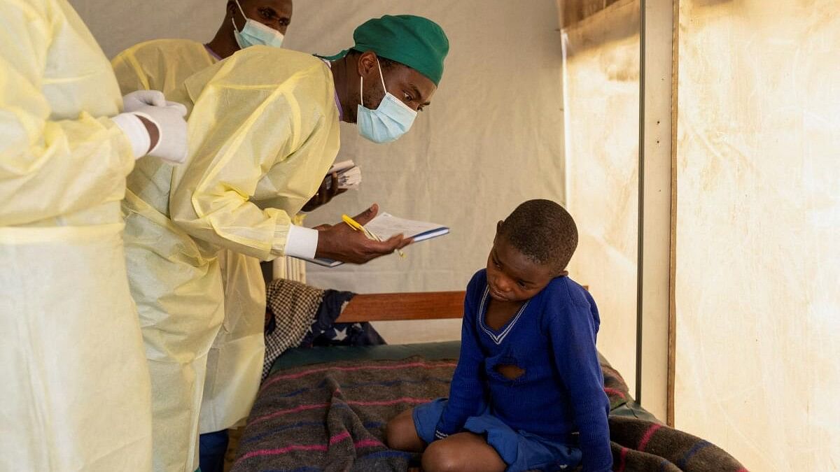 <div class="paragraphs"><p>Doctors examine a child  suffering from Mpox near Goma, North Kivu province, Democratic Republic of the Congo.&nbsp;</p></div>