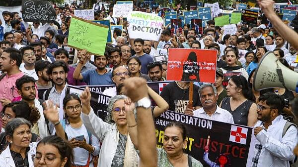 <div class="paragraphs"><p>Doctors stage a protest march amid the 24-hour nationwide strike called by the Indian Medical Association (IMA) demanding justice for the woman doctor who was allegedly raped and murdered at Kolkata's R G Kar Medical College and Hospital, in New Delhi, Saturday, Aug 17, 2024.</p></div>