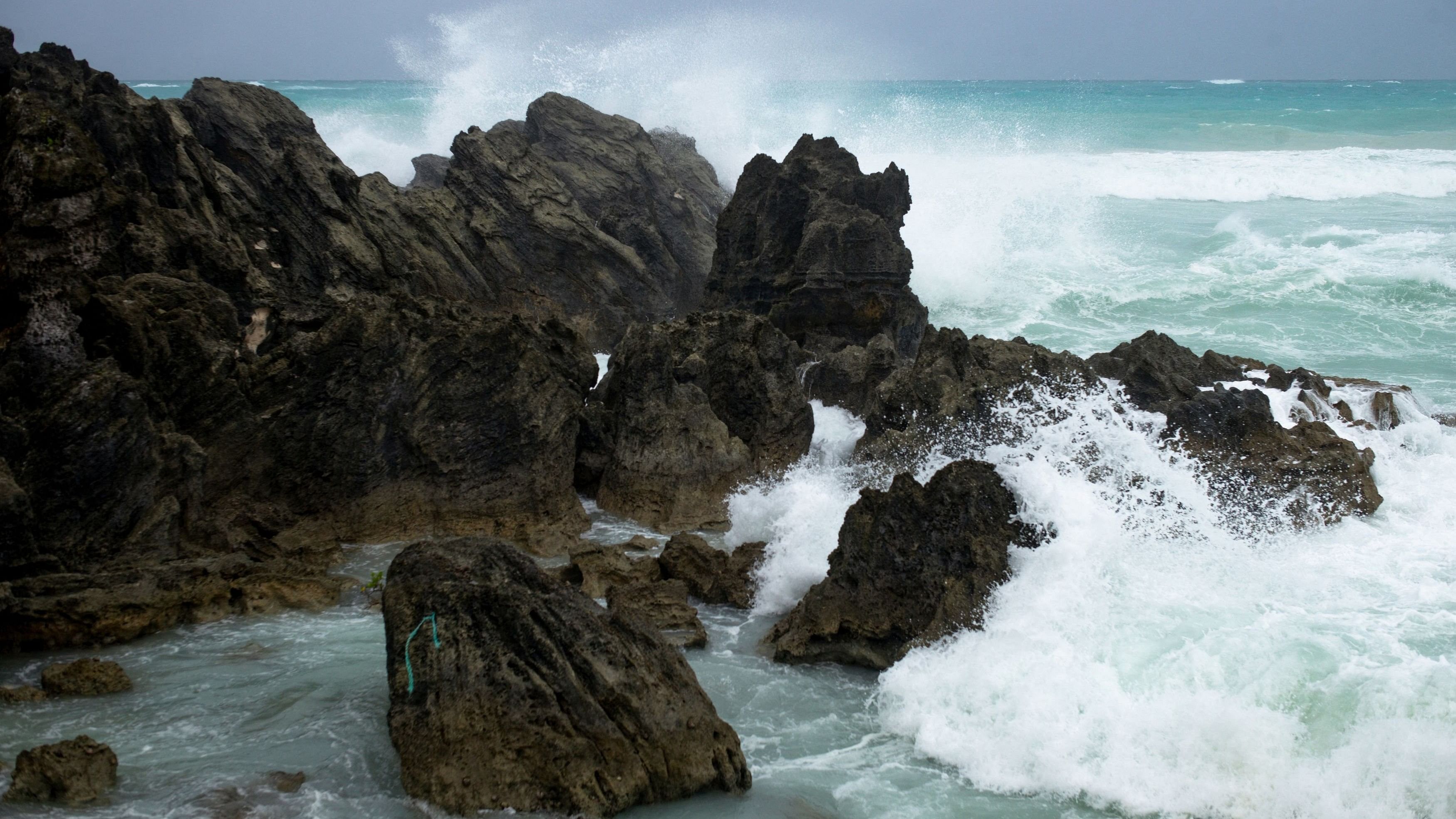 <div class="paragraphs"><p>Waves crash against the South Shore as winds from Hurricane Ernesto approach Church Bay, Bermuda.</p></div>