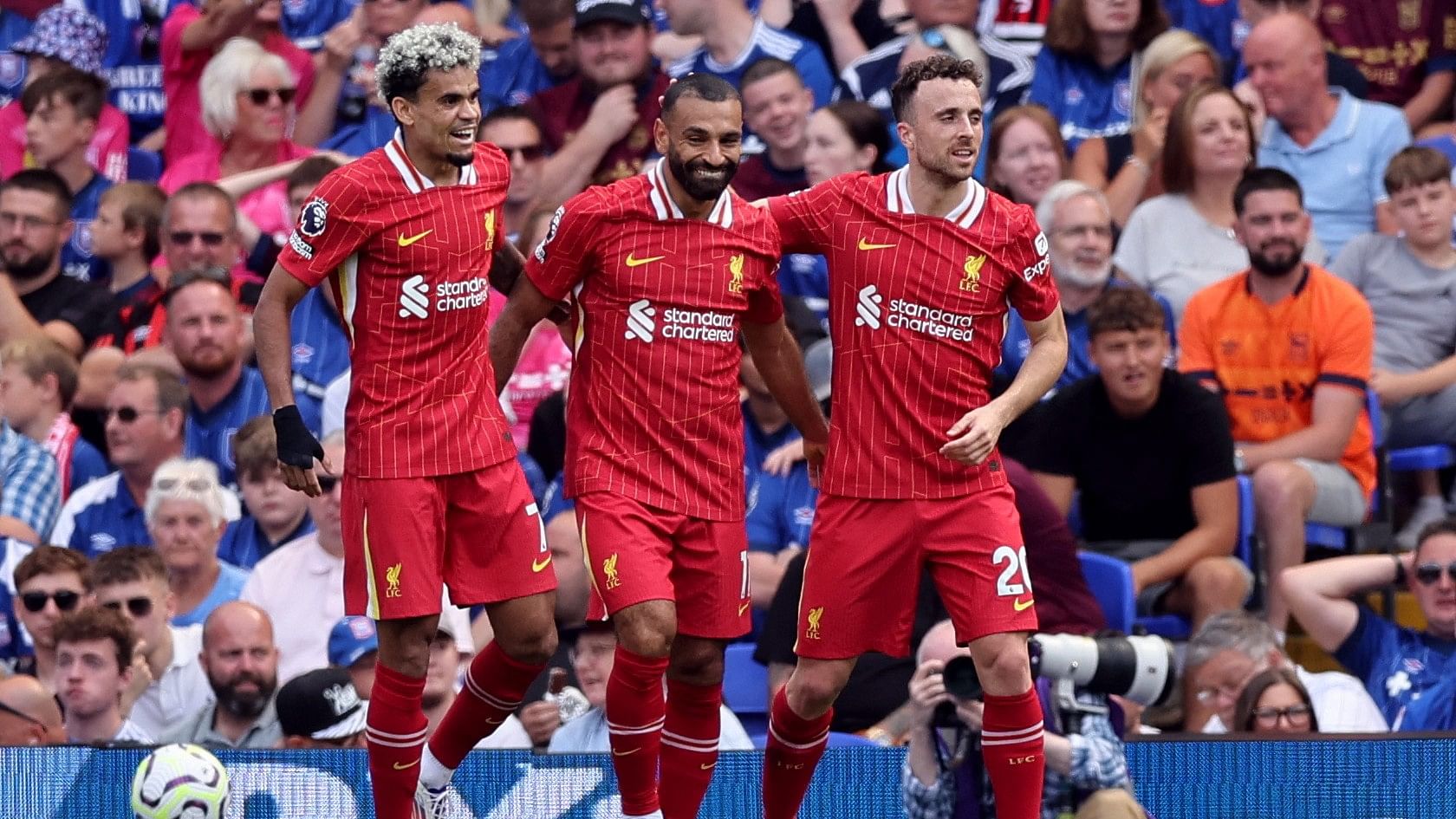 <div class="paragraphs"><p>Liverpool's Mohamed Salah celebrates scoring their second goal with Luis Diaz and Diogo Jota.</p></div>