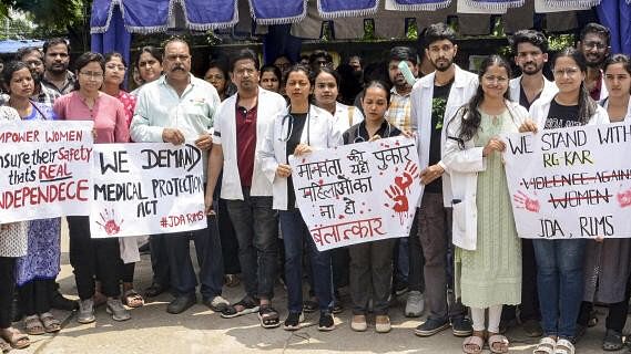 <div class="paragraphs"><p>Doctors of Rajendra Institute of Medical Sciences stage a protest against the alleged rape and murder of a woman doctor at Kolkata's R G Kar Medical College and Hospital, in Ranchi.</p></div>